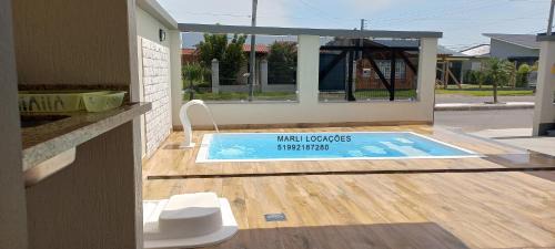 Capao da Canoa House | Pet-Friendly Oasis with Pool Near the Ocean in Capão Da Canoa