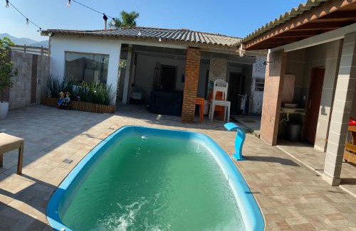 Palhoca House | Casa com piscina próximo à praia