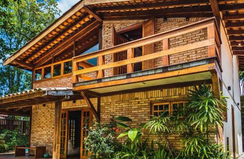 Centro Comercial House | Discover Casa with Tennis Court & BBQ in Ihabela