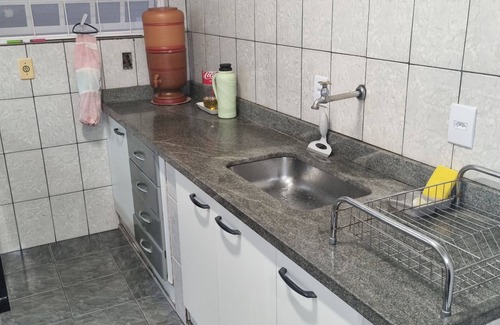 Regiao Urbana Homogenea VI House | Cozy Casa with Suite, Living Room & Kitchen Awaits You