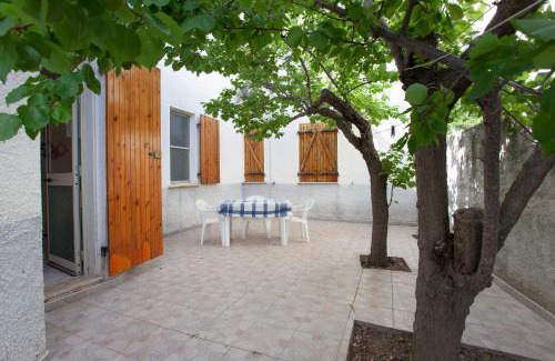 Monte Longu Apartment | Charming Casa con Giardino: Relax in a Pet-Friendly Retreat