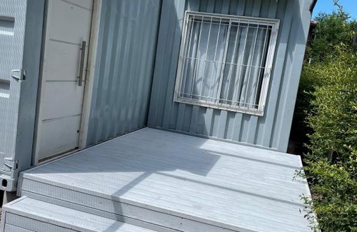 Potrero de los Funes House | Idyllic Casa Container by the River in Potrero de los Funes