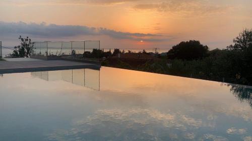 Kanali Apartment | Idyllic Casa Costa Suites - Oceanfront Escape with Pool