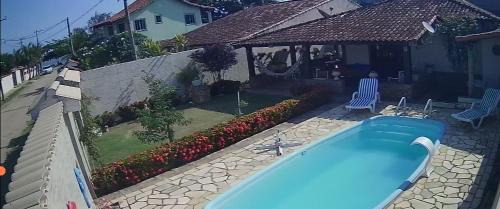 Sao Pedro da Aldeia House | Oceanfront Casa da Lua: 4-Star Paradise with Pool Access
