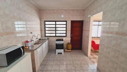 Zona Norte House | Casa das flores