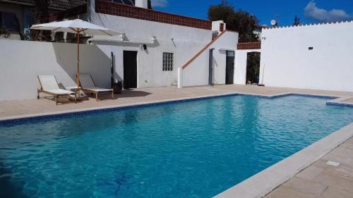 Paco Apartment | Relax at Casa das Flores with Ocean Views and Pool Access
