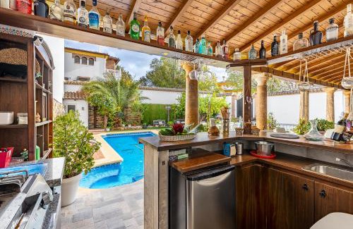 Illora Villa | Relax at Casa de Amigos La Latina: Pool & Hot Tub Oasis