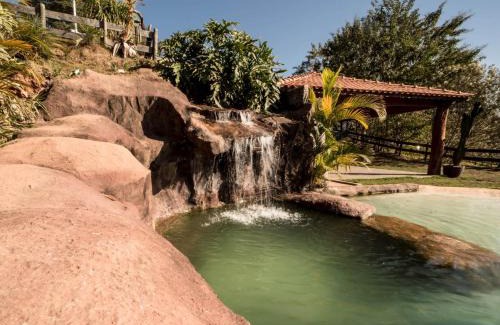 Sao Lourenco House | Experience Casa de Campo with Enchanting Waterfall Oasis