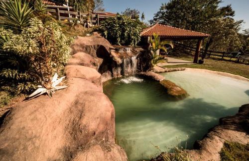 Sao Lourenco House | Experience Casa de Campo with Enchanting Waterfall Oasis
