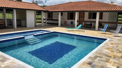 Quadra House | Casa de Campo: Family-Friendly Getaway with Pool & Grill