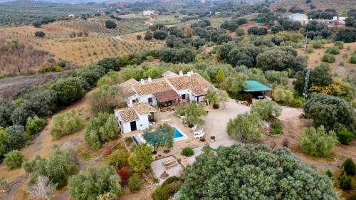 Villanueva de Tapia House | Discover LA MEJORANA: Poolside Retreat in Málaga Norte