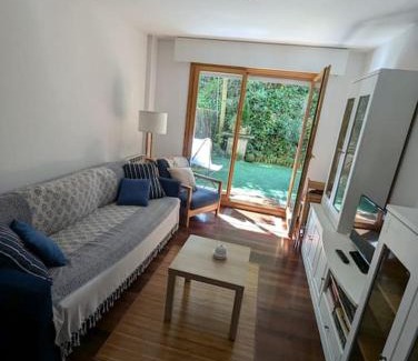Comillas City Center Apartment | Casa de Claudia Comillas: Private Garden Near Gaudí's Capricho