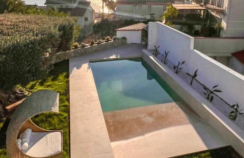 Sant Carles de la Rapita Villa | Elegant Oceanfront Retreat at Casa de vacaciones en La Ràpita
