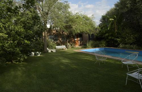 Cordoba Apartment | Exceptional Casa de Flores: Poolside Serenity Awaits