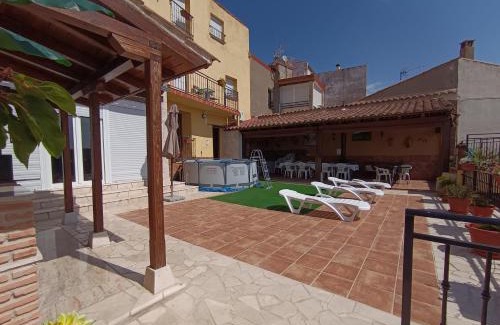 Colmenar de Oreja Apartment | Experience Casa de la Abuela Pili: Oceanfront Gem with Pool