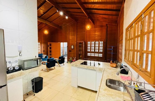Palestina Ski Chalet | Exceptional Feitosa Wooden House with Oceanfront Views
