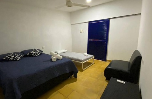 Tierra Bomba Island House | Beachfront Getaway with Caribbean Access and Pet-Friendly Perks