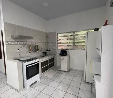 Pedrinhas House | Experience Casa de Praia: Gourmet Area & Pet-Friendly Bliss