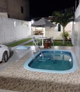 Aruanda House | Relaxing Oceanfront Retreat at Casa de Temporada Recanto Feliz