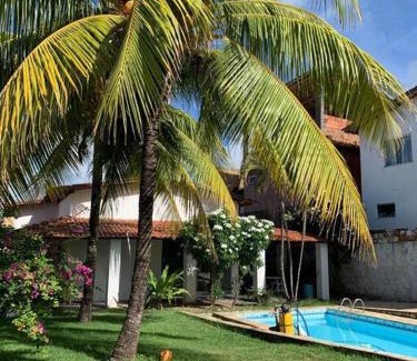 Ipitanga House | Idyllic Casa de Veraneio: Pool & Oceanfront Bliss