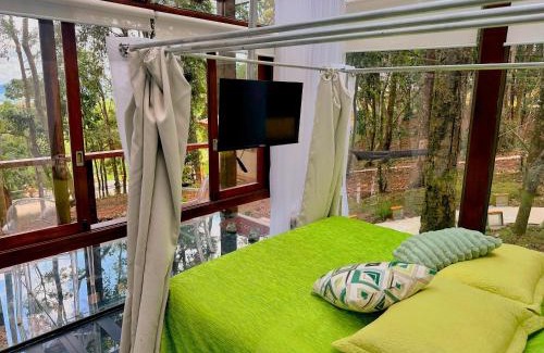 Bueno Brandao Apartment | Experience Casa de Vidro - Vila Mágica with Oceanfront Views