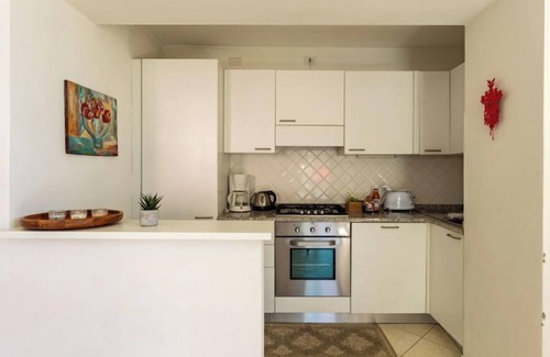 San Carlo Apartment | Experience Casa degli Angeli: Oceanfront Retreat with Spa