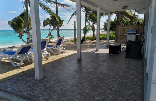 Tar Bay Apartment | Beachfront Casa Del Marjorie: Family-Friendly Retreat