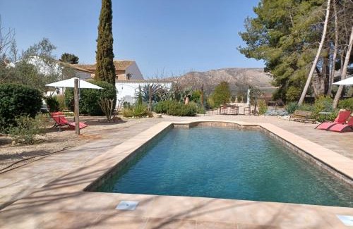 Beneixama House | Cozy Casa del Riu: Oceanfront Stay with Pool & Breakfast