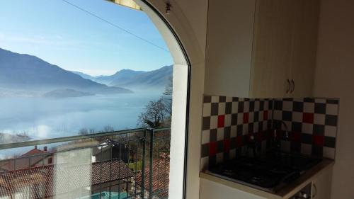 Sorico Apartment | Seaside Escape at Casa delle Camelie with Pool & Breakfast