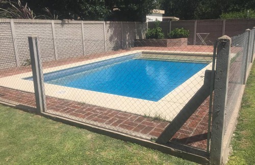 Funes Apartment | Relax at Casa Departamento Funes with Pool & Ocean View