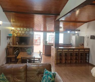 Foz do Iguacu Ski Chalet | Palm-Surrounded Casa do Mato near Iguassu Falls with Pool