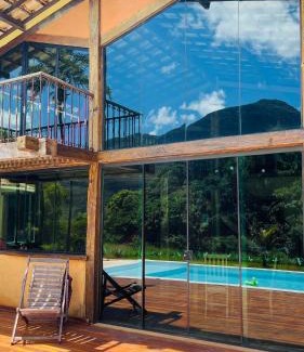 Lapinha da Serra House | Explore Casa do Sóter: Poolside Retreat with 10/10 Ratings