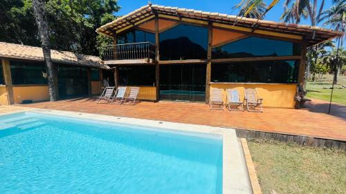 Lapinha da Serra House | Explore Casa do Sóter: Poolside Retreat with 10/10 Ratings