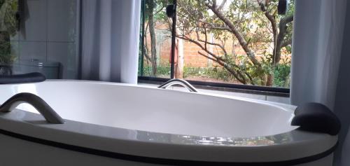 Chapada dos Guimaraes House | Pet-Friendly Stay at Casa do Sol with Hot Tub & Kitchen