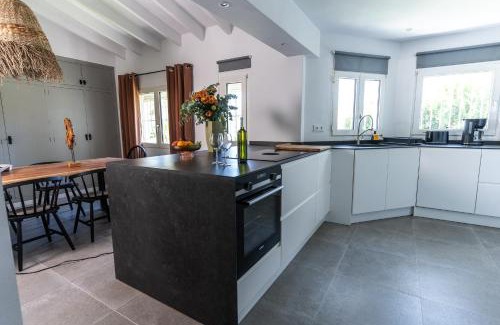 Denia Ski Chalet | Experience Casa Dona: Oceanfront Bliss with Family Amenities