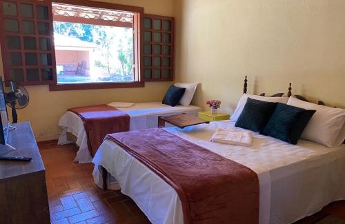 Itabirito Bed & Breakfast | Discover Casa dos Coqueiros: Poolside Comfort & Events