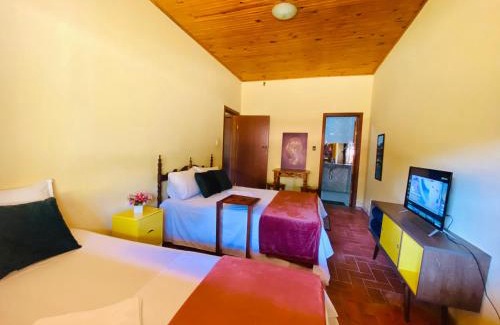 Itabirito Bed & Breakfast | Discover Casa dos Coqueiros: Poolside Comfort & Events