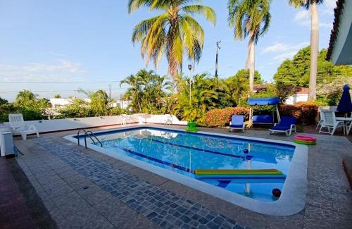 Girardot House | Discover Casa El Peñon: Pet-Friendly Hotel with Spa & Pool