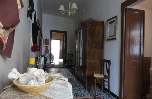 Baratili San Pietro Apartment | Inviting Casa Elvira with Kitchen Amenities for Your Stay