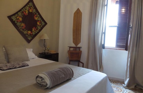 Baratili San Pietro Apartment | Inviting Casa Elvira with Kitchen Amenities for Your Stay