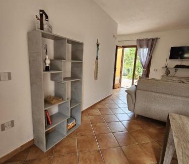 Porto Pollo House | Cozy Casa Elvira: Oceanview Retreat with Pet-Friendly Perks
