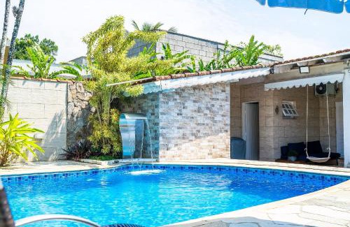 Boraceia House | Relax at Casa com Piscina in Bertioga – 4-Star Retreat