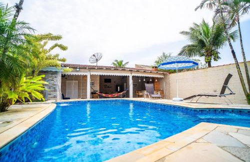 Boraceia House | Relax at Casa com Piscina in Bertioga – 4-Star Retreat