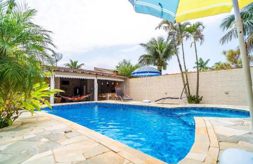 Boraceia House | Relax at Casa com Piscina in Bertioga – 4-Star Retreat