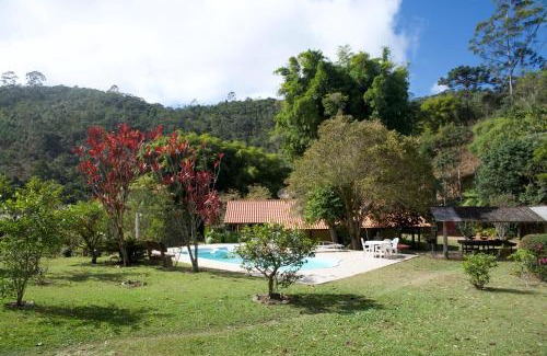 Nova Friburgo House | Idyllic Casa em Friburgo: Pool, Fireplace & Ocean Views