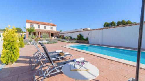 Arenas del Rey Villa | Discover Casa Embalse Bermejales: Family-Friendly Retreat