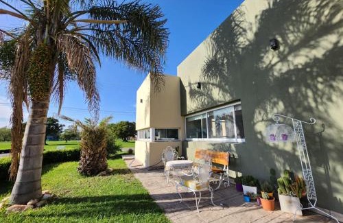 San Nicolas de los Arroyos House | Pet-Friendly Casa en Club de Campo with Pool & Ocean View