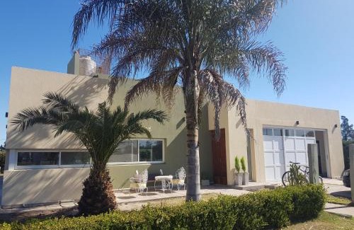 San Nicolas de los Arroyos House | Pet-Friendly Casa en Club de Campo with Pool & Ocean View