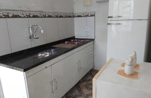 Novo Gloria House | Cozy 2-Bedroom Home with Gourmet Area & Wi-Fi Access