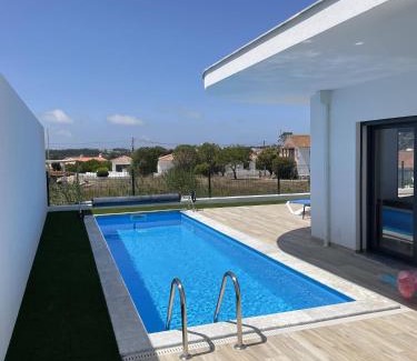 Nadadouro Villa | Oceanfront Casa Felino: Top-Rated Stays with Pool Access